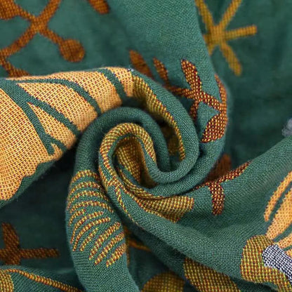 100% cotton reversible throw blanket with teal and mustard bird pattern for sofa or bed