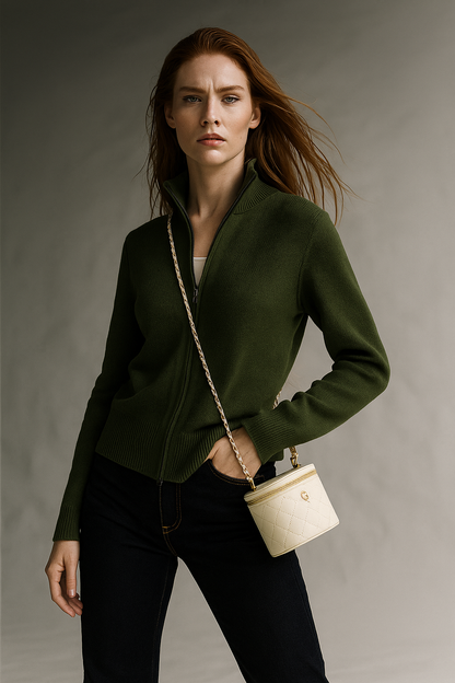 Women’s green wool zip-up cardigan by Christine Brewer, featuring a stylish fit and front zipper detail.