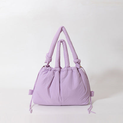 Dames gewatteerde handtas met zachte structuur en stijlvolle look