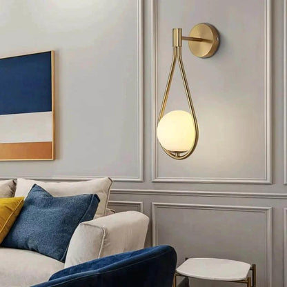 Wall light DARBE Nordic Brass Wall Light with frosted glass globe, mounted on living room wall
