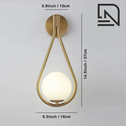 DARBE - Nordic Brass Wall Light, Frosted Glass Globe Design; wall-mounted fixture with brass teardrop frame.