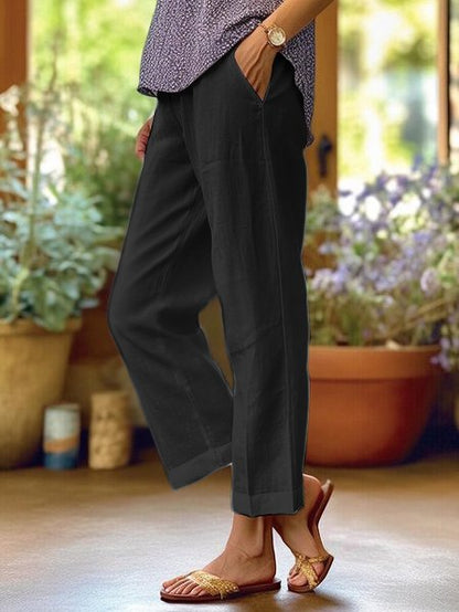 Dames Broek Losvallend met Taps Toelopende Pijpen en Zakken