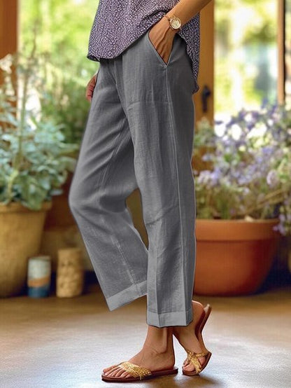 Dames Broek Losvallend met Taps Toelopende Pijpen en Zakken