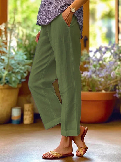 Dames Broek Losvallend met Taps Toelopende Pijpen en Zakken