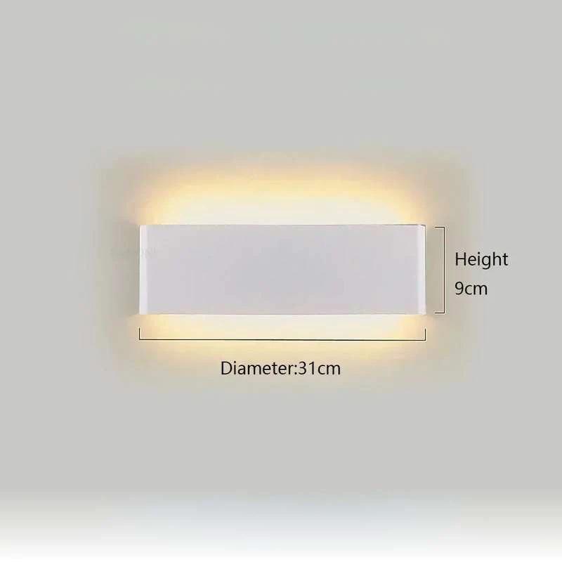 Minimalist aluminium LED wall light with up and down lighting; white rectangular fixture on wall.