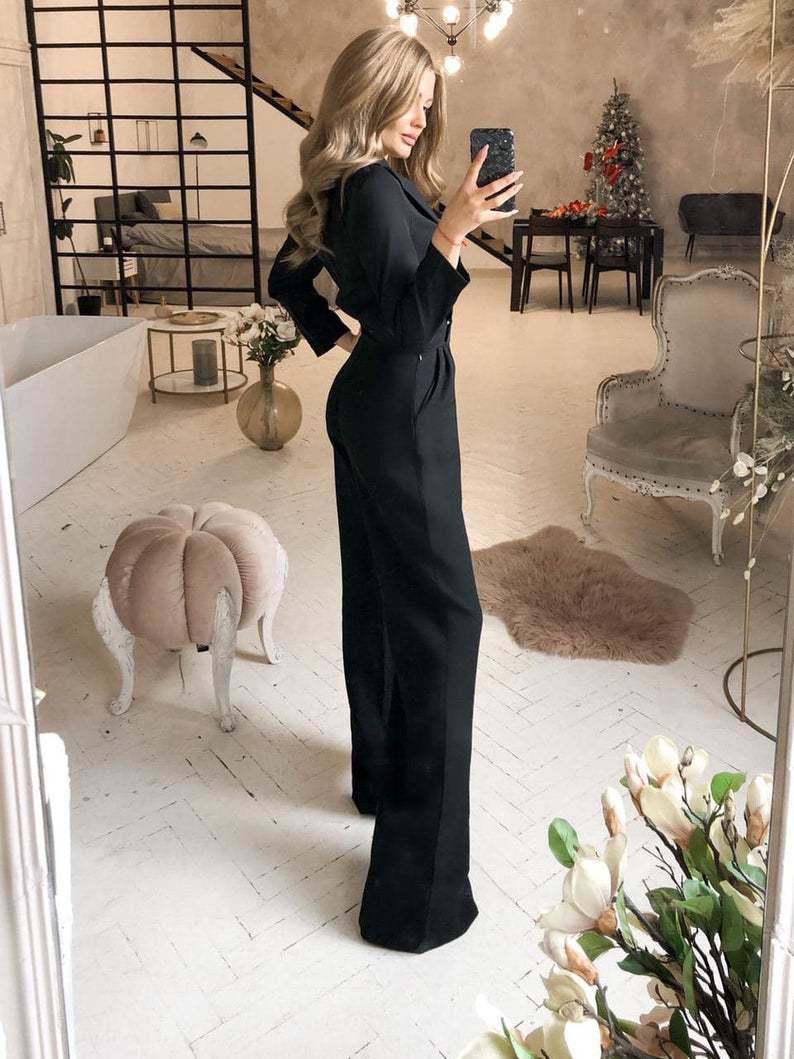 damesjumpsuit Wani glitter zwart damesjumpsuit Wani glitter zwart