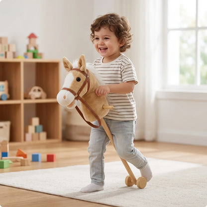 Toddler pushing a light brown plush stick horse toy on wooden wheels