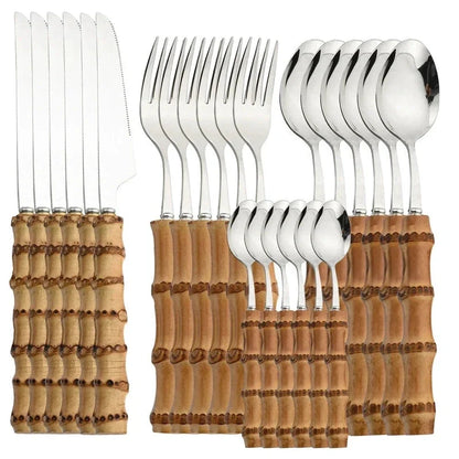 24-Piece Bamboo Handle Cutlery Set - Stainless Steel Flatware: knives, forks and spoons arranged for dining.