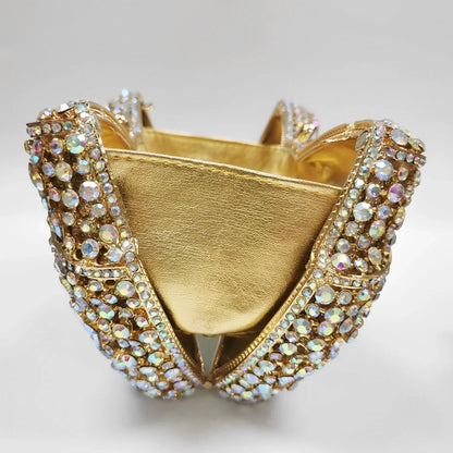Elegant clutch bag in a soft, textured fabric, featuring sleek design and subtle clasp closure, top view — 10 — view 10