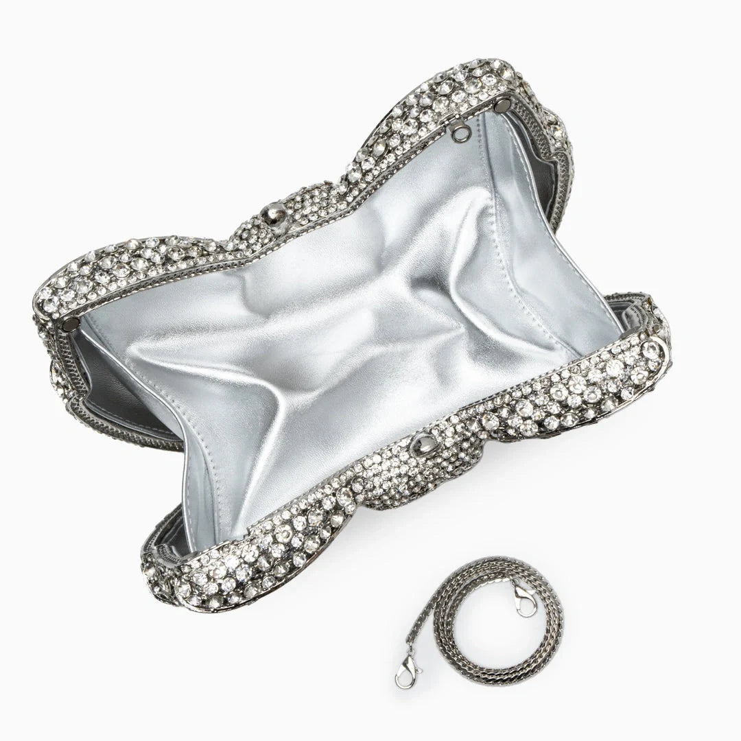 Elegant clutch bag in a soft, textured fabric featuring sleek design and subtle metallic clasp, front view — 13 — view 13