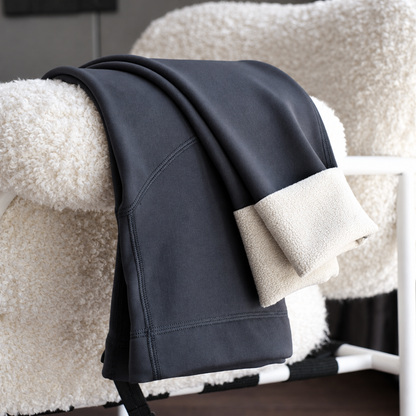 Coffee Khaki maternity thick fleece leggings with belly support panel draped over a chair