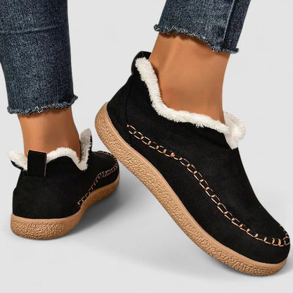 Dorry orthopedic women's boots by Christine Brewer, featuring supportive design and comfortable fit, shown in black leather.