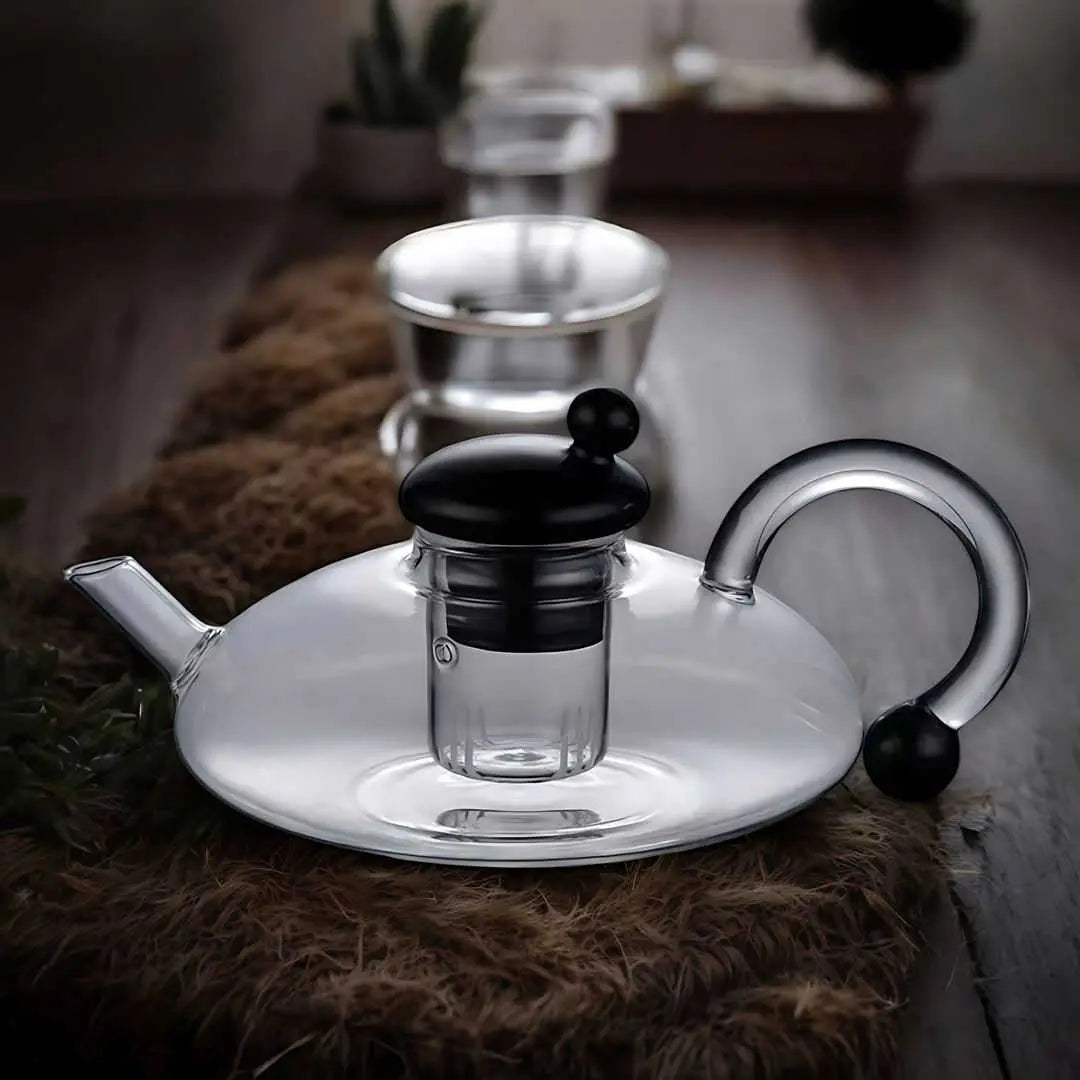 glass teapot set with cups in transparent