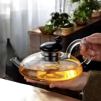 glass teapot set with cups in transparent