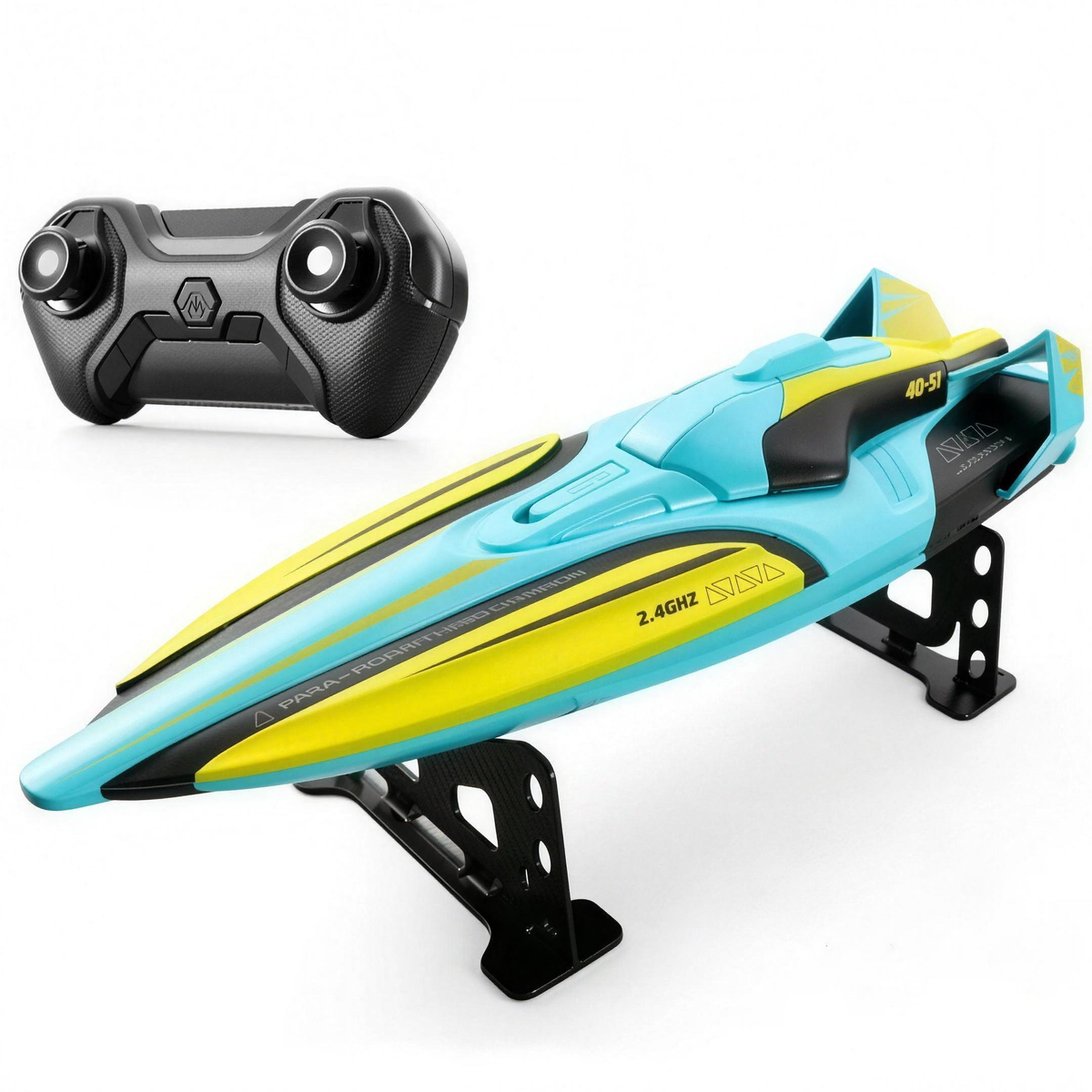 Green RC racing boat with 2.4GHz remote control, studio shot