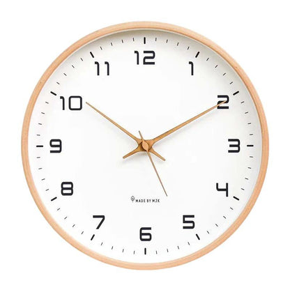 Nordic Wooden Wall Clock on white wall with wooden frame, white dial and copper hands; Made by MJK.