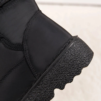 Saskia zwarte winterlaars, close-up hak en zool