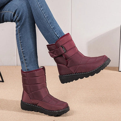 Saskia bordeaux winterlaars, zijaanzicht gedragen met legging