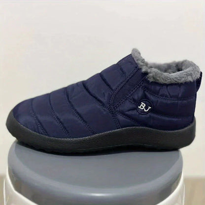 Tessa gevoerde snowboots in marineblauw, zijaanzicht