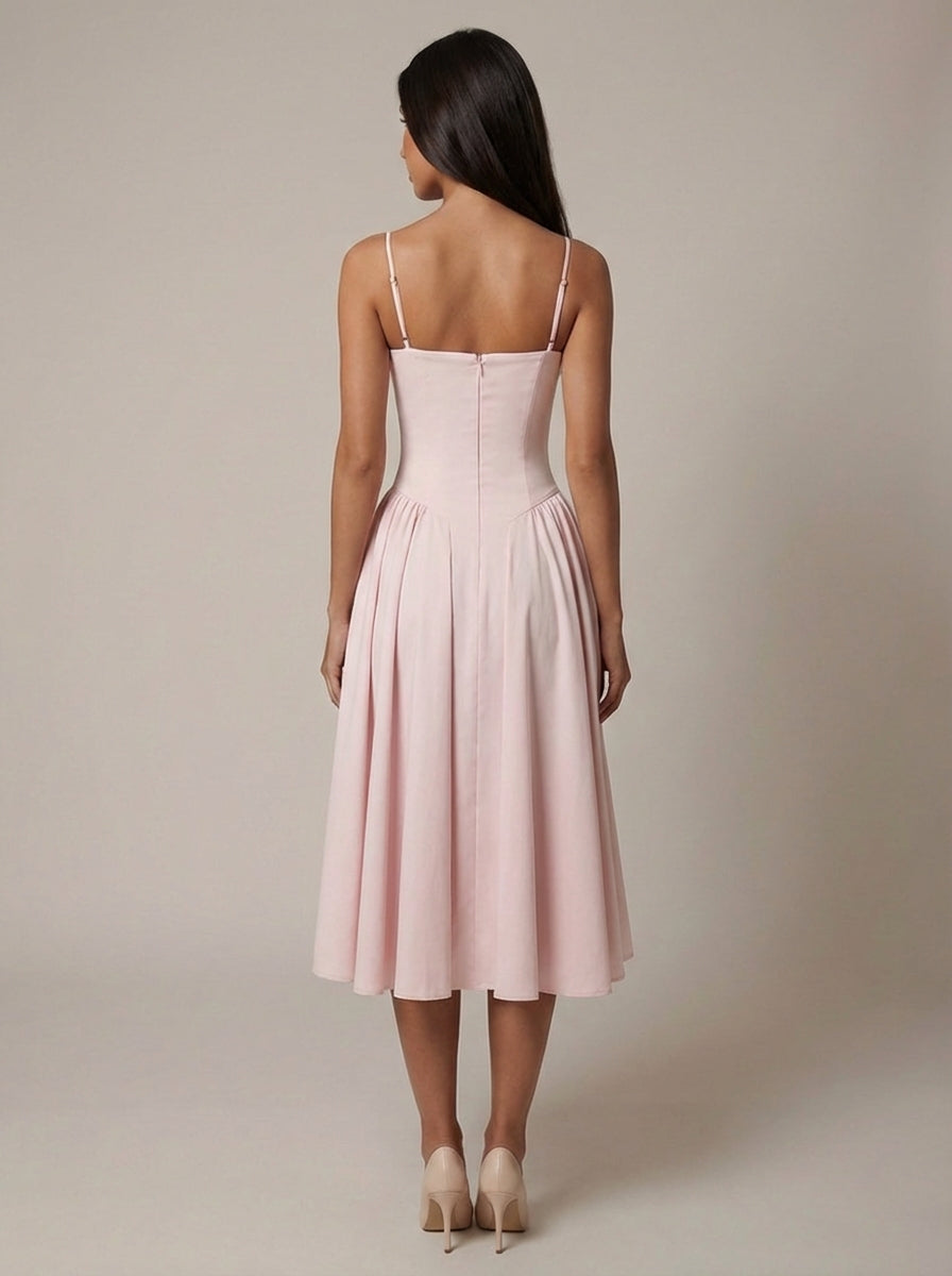 Back view of blush corset midi dress showing zip closure