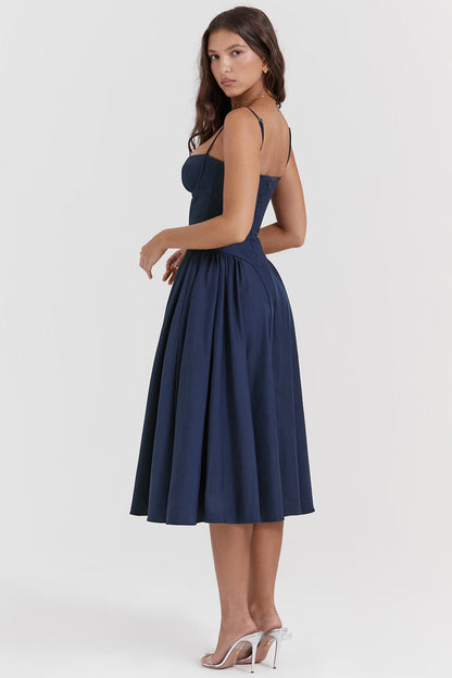 Back view of navy corset midi dress with thin straps