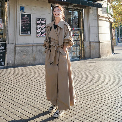 Emily women's oversized double-breasted longline trench coat by Christine Brewer, shown in a stylish longline design with a classic collar.